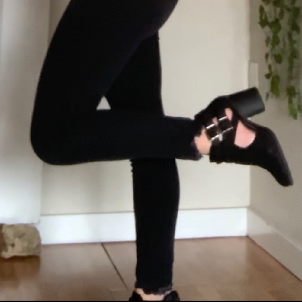 Black strappy booties with buckles